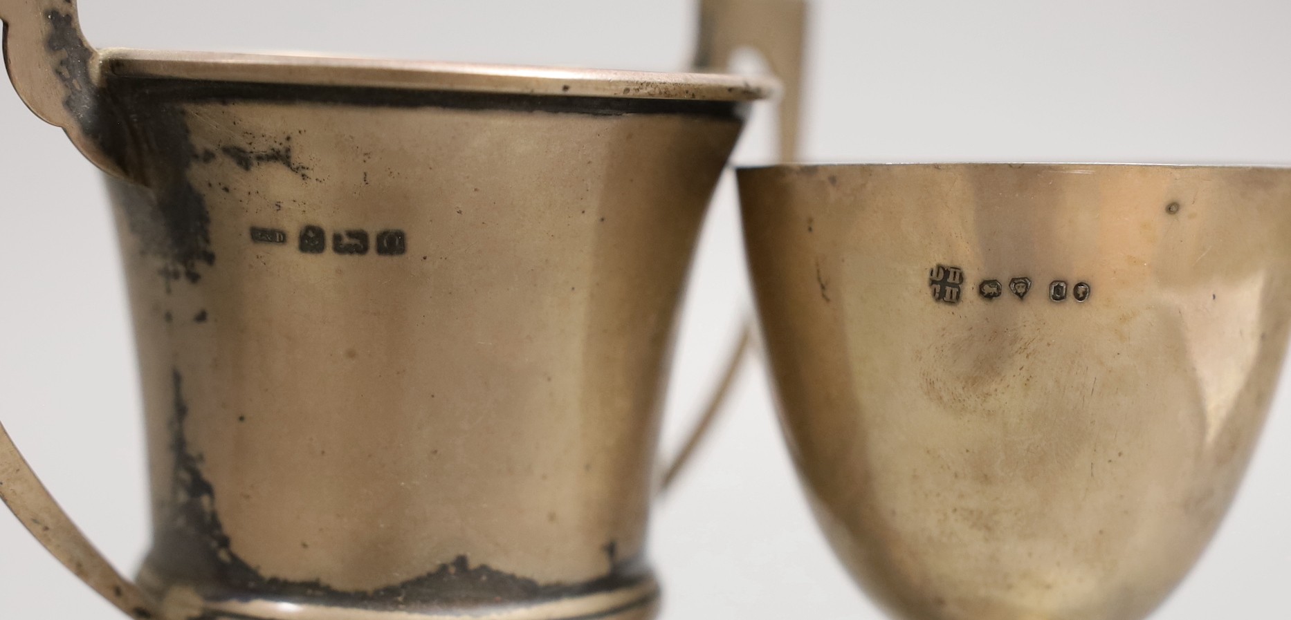 A Victorian silver goblet, by Daniel & Charles Houle, London, 1869, 11.5cm and a later two handled small cup, 6.1oz.